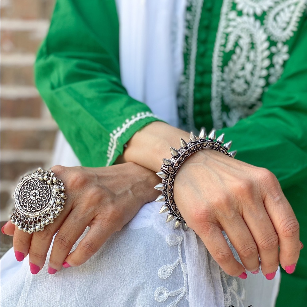 Spiked hinged bangle.